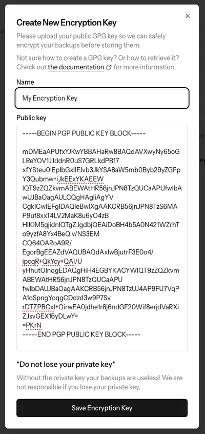 A screenshot showing an input for the encryption key name, as well as the encryption key itself in a modal.